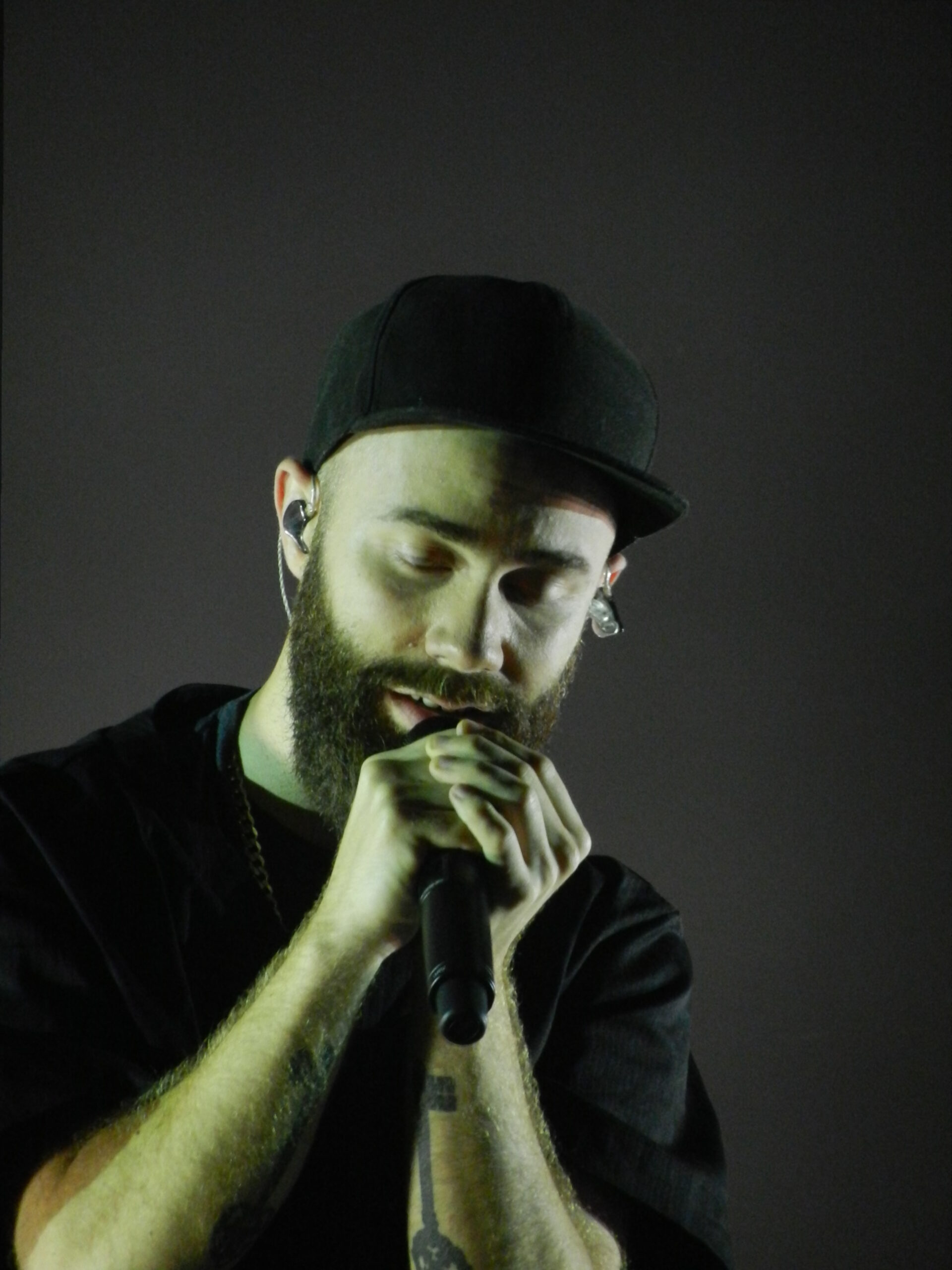"Woodkid" by lacriseduquartdevie is licensed under CC BY 2.0.